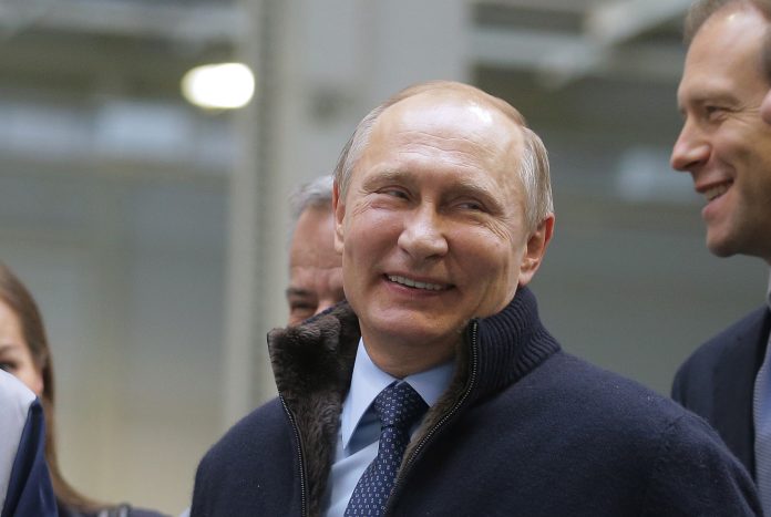 Putin laughing