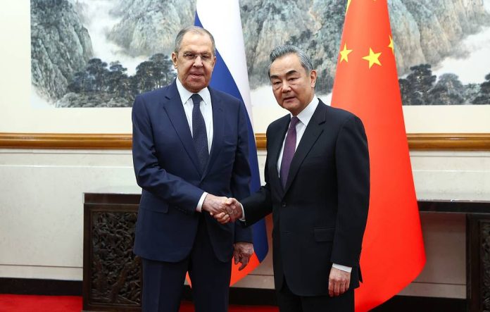 Russian Foreign Minister Sergey Lavrov with his Chinese counterpart, Wang Yi