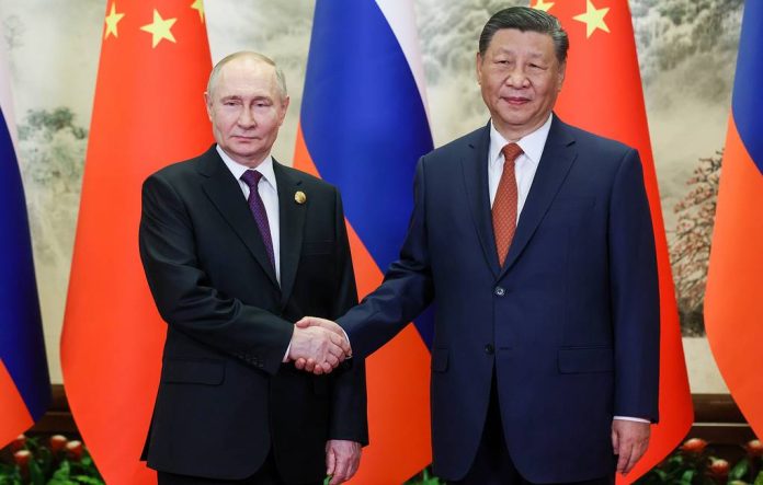 Russian President Vladimir Putin visits Xi Jinping
