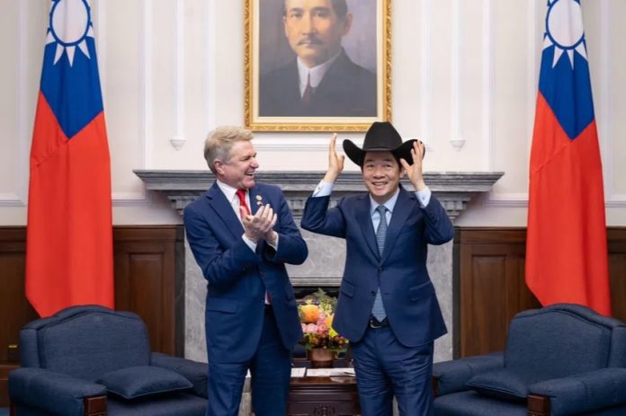 Taiwan’s President Lai Ching-te (R) and US Representative Michael McCaul