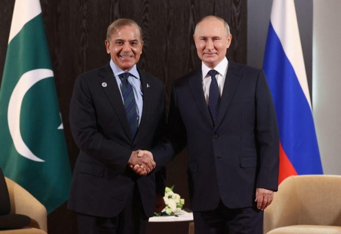 Vladimir Putin with Shahbaz Sharif
