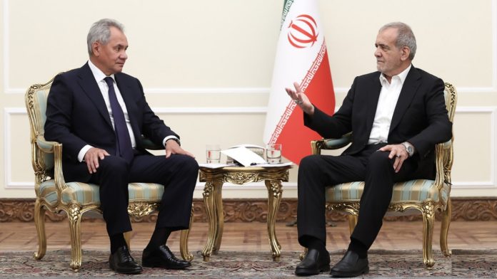 Iranian President Massoud Pezeshkian with Russian Security Council Secretary Sergei Shoigu