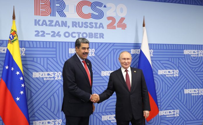 Putin with President Nicolas Maduro